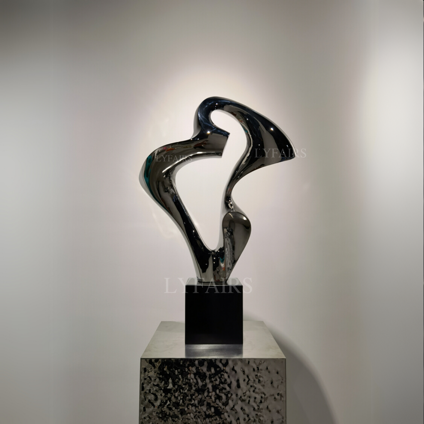 Sleek Metallic Flowing Form Art Sculpture