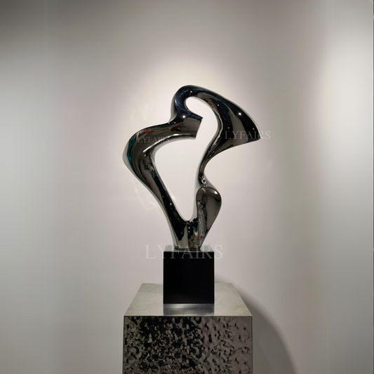 Sleek Metallic Flowing Form Art Sculpture