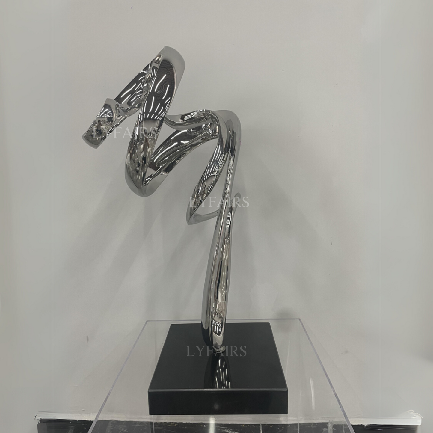 Sleek Polished Stainless Steel Twisting Ribbon Contemporary Sculpture